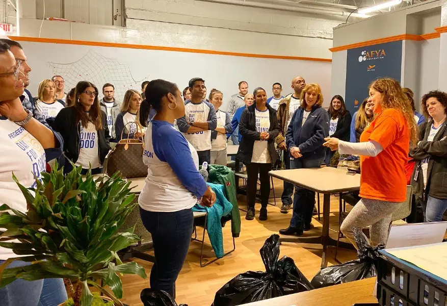 Volunteers meeting in a classroom